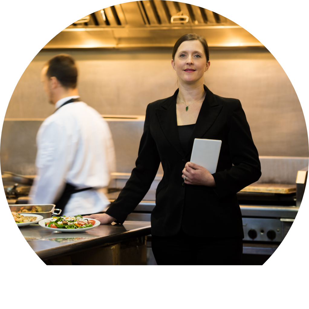 Woman standing next to kitchen counter