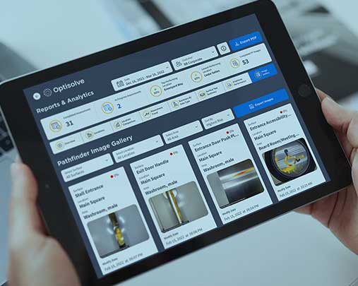 Tablet showing Optisolve software reports and analytics